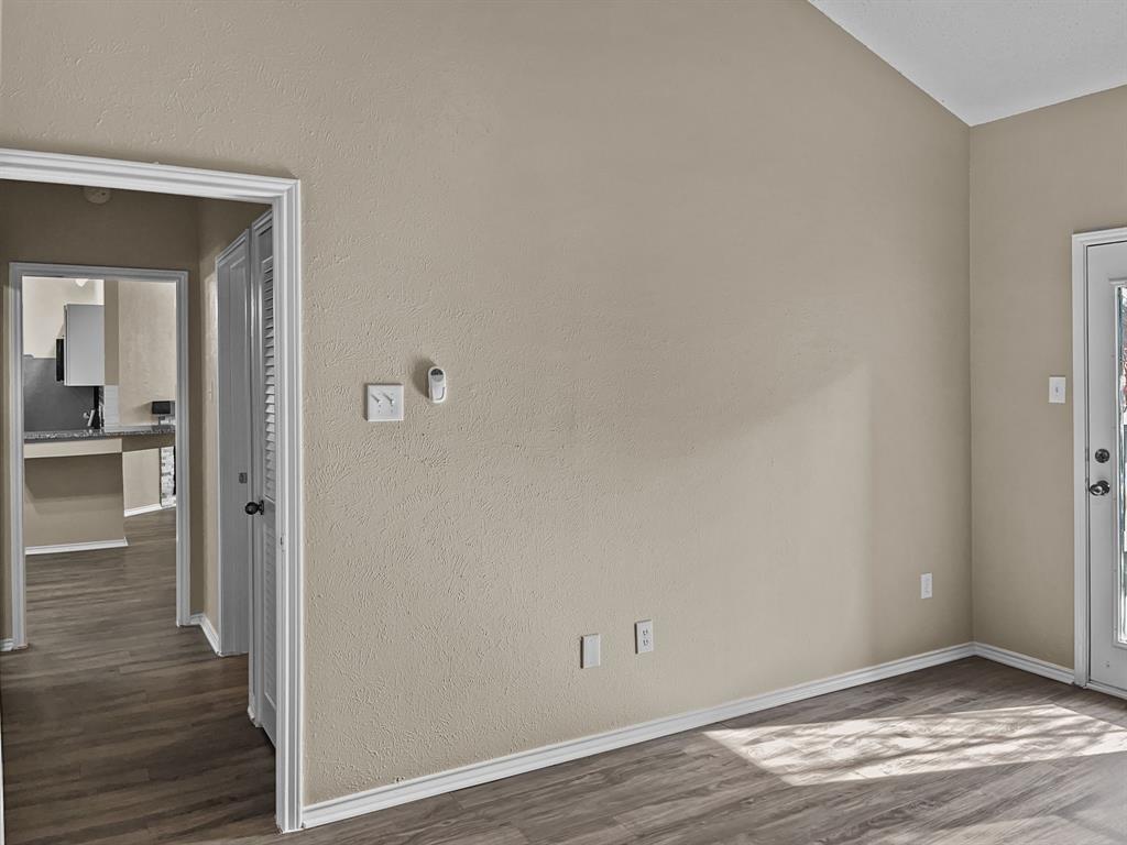 9600 Royal Lane, Unit 112 Dallas, TX 75243 - Photo 10 of 19 a view of a room with wooden floor