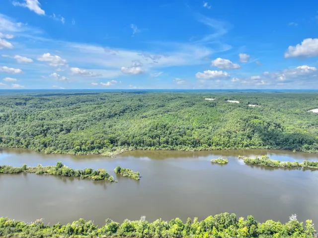a view of a lake with a city