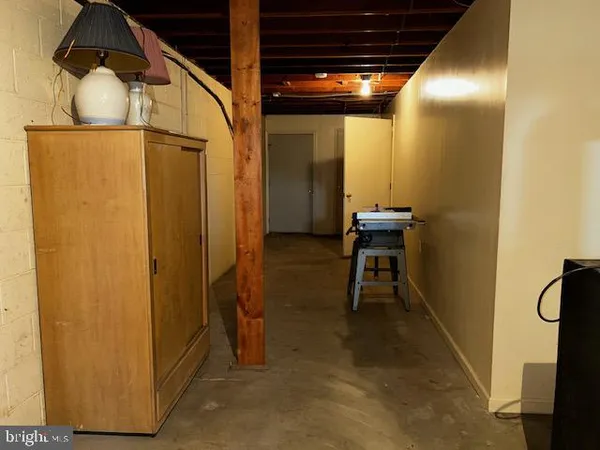 a view of a hallway with a room