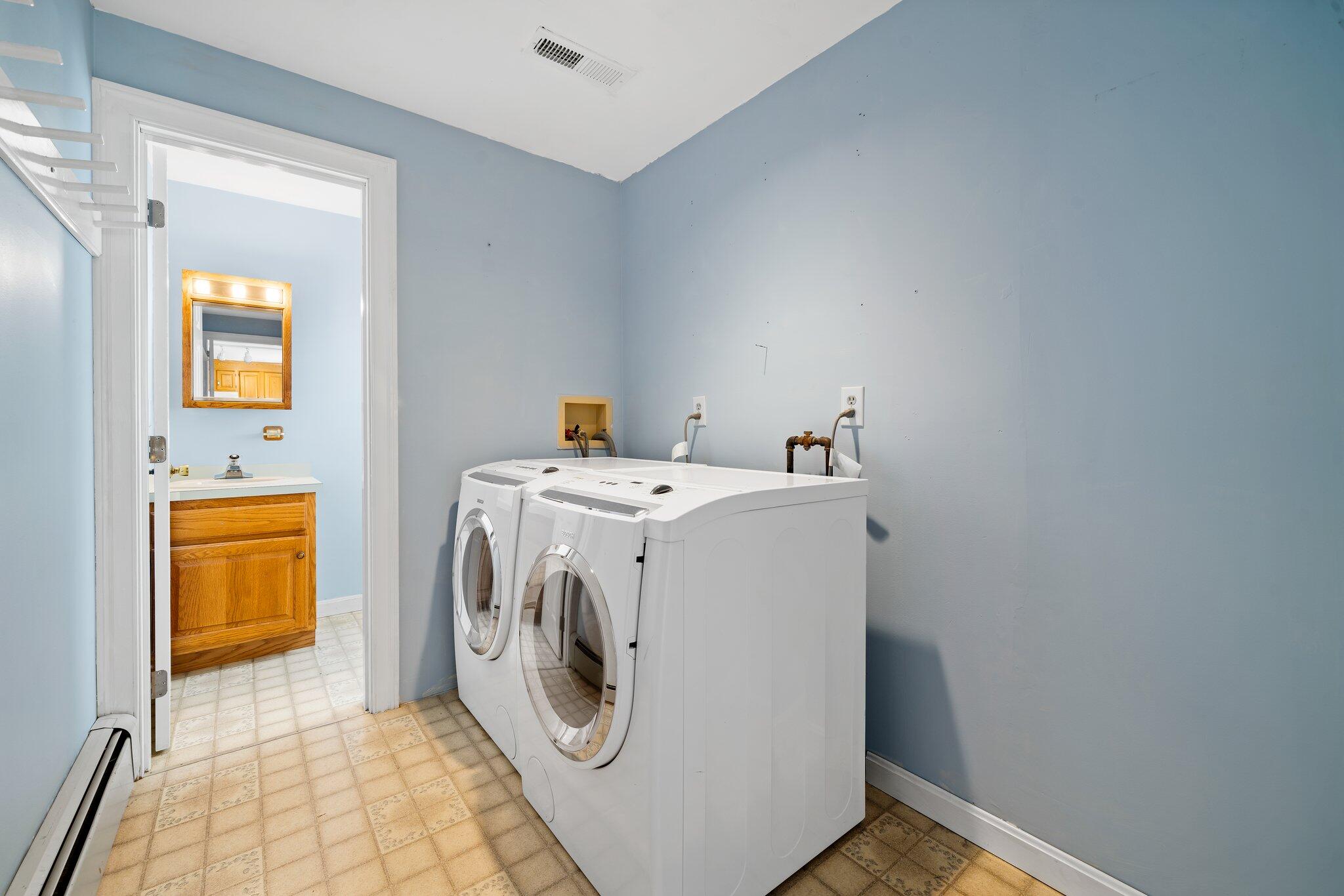 7 Abbey Gate Road Cotuit, MA 02635 - Photo 11 of 41 a utility room with dryer and washer