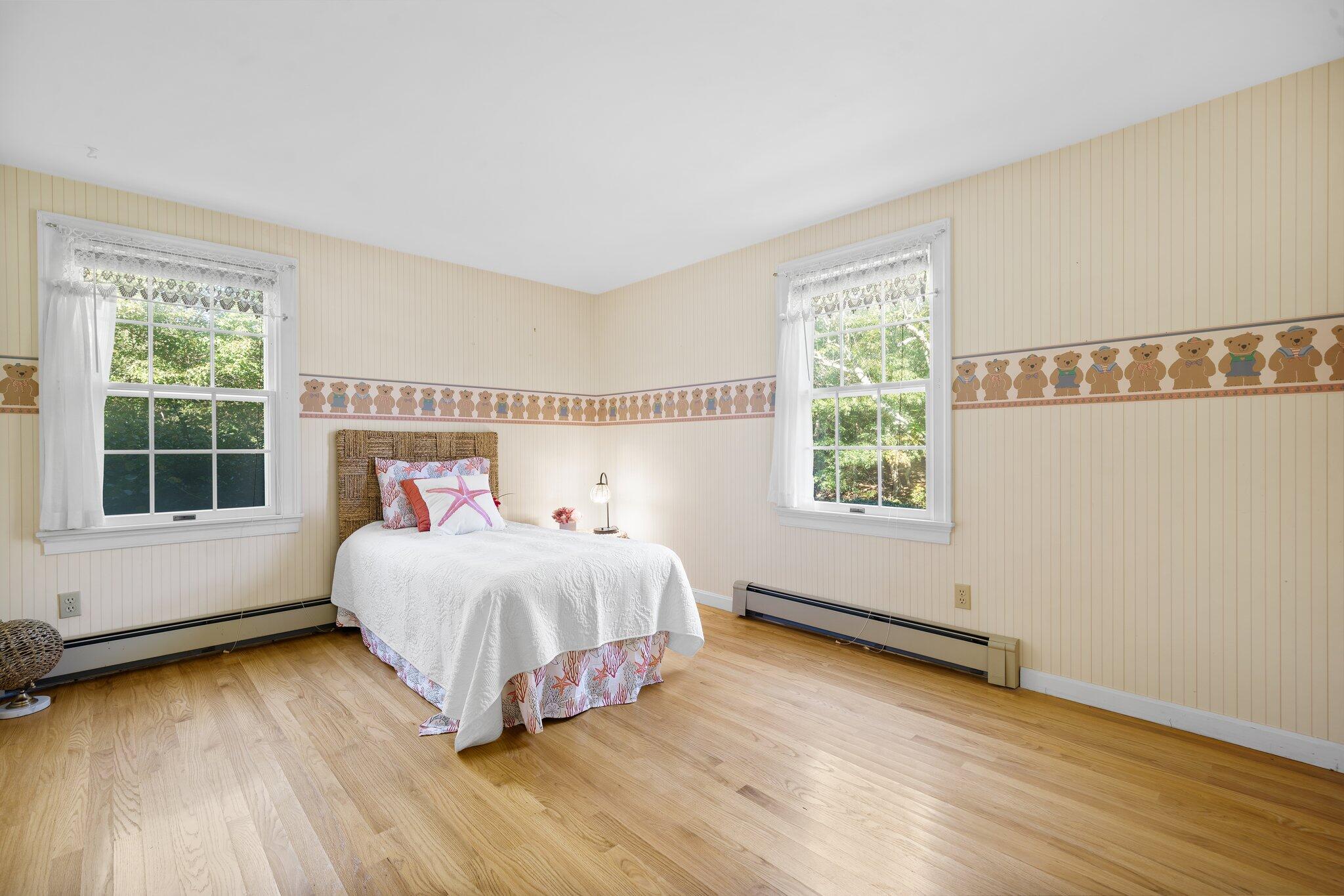 7 Abbey Gate Road Cotuit, MA 02635 - Photo 13 of 41 a bedroom with a bed and a window
