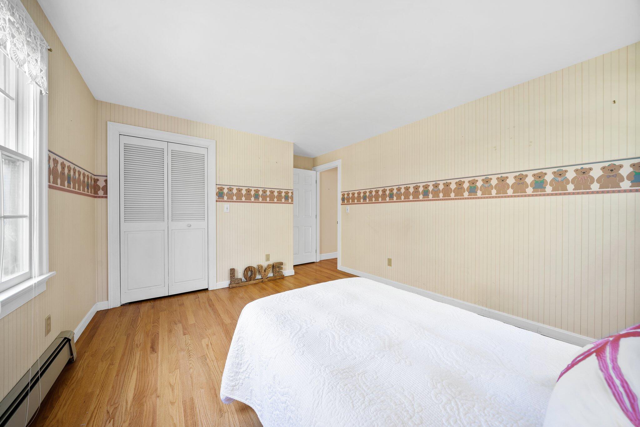 7 Abbey Gate Road Cotuit, MA 02635 - Photo 14 of 41 a bed room with a bed and a window
