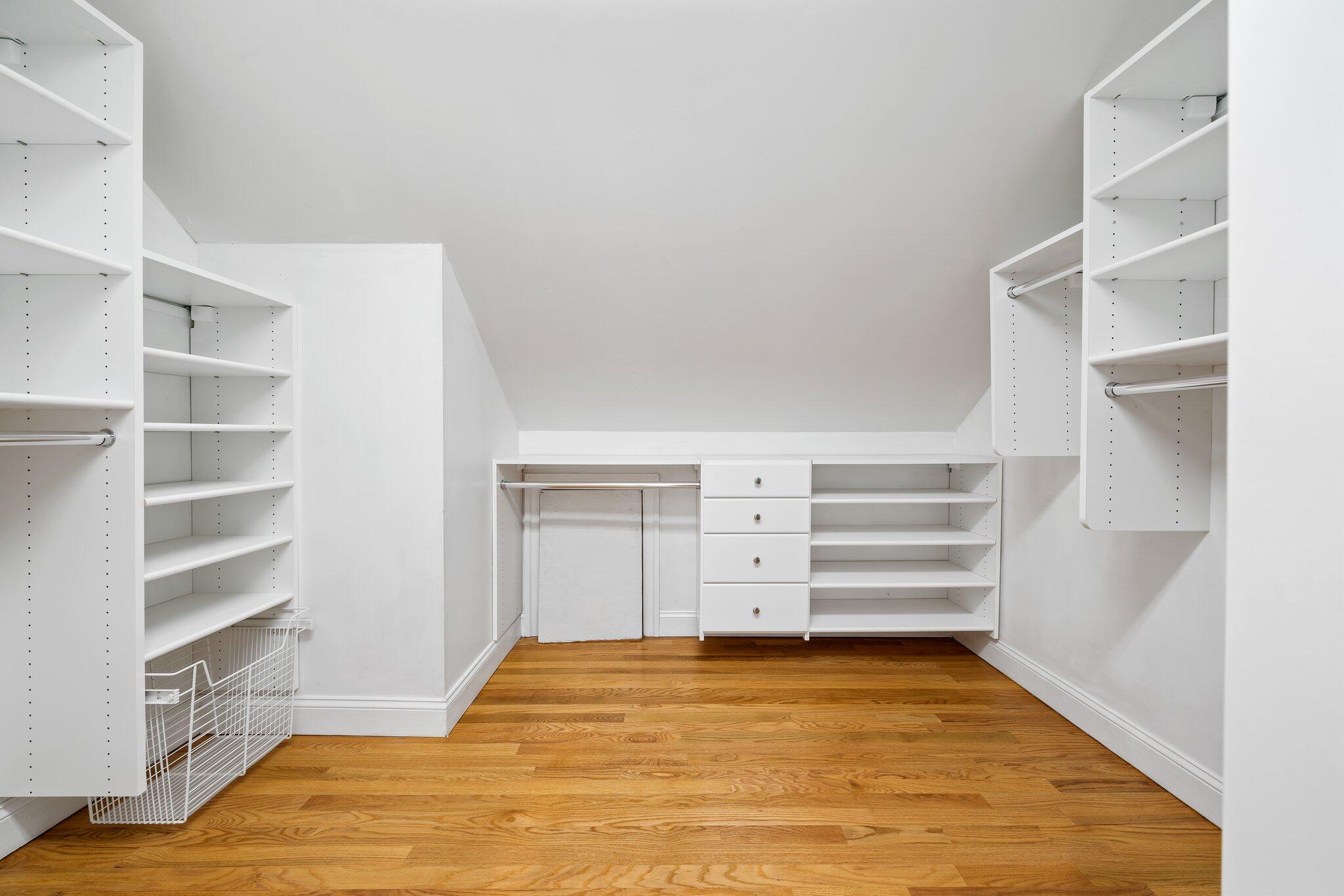7 Abbey Gate Road Cotuit, MA 02635 - Photo 26 of 41 a view of walk in closet with empty racks