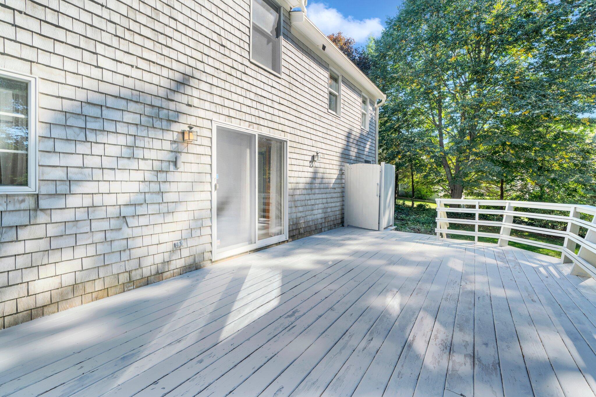 7 Abbey Gate Road Cotuit, MA 02635 - Photo 34 of 41 a view of an empty room with wooden floor and a window