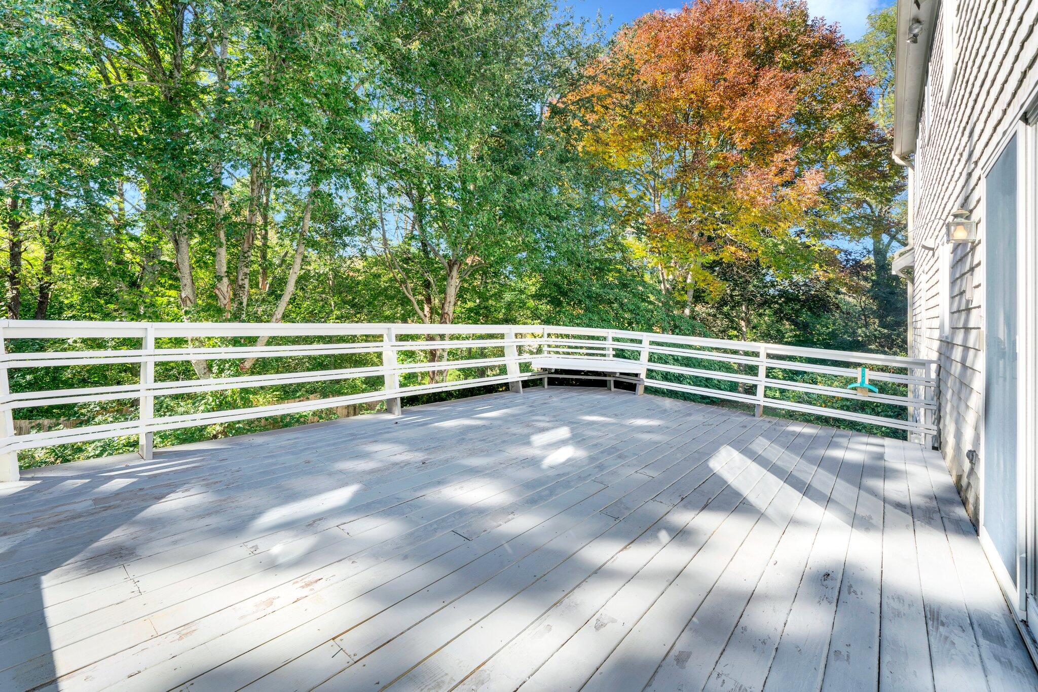 7 Abbey Gate Road Cotuit, MA 02635 - Photo 36 of 41 a view of backyard with deck and wooden floor