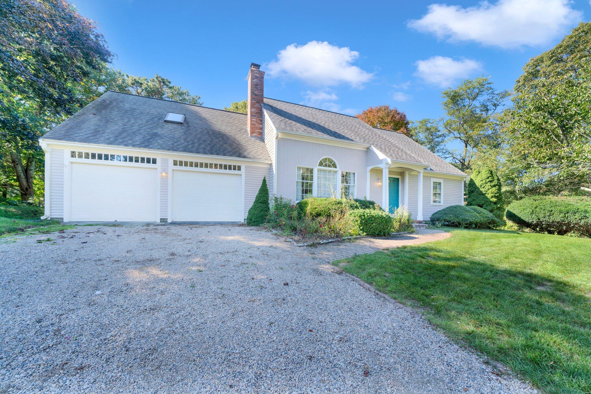 7 Abbey Gate Road Cotuit, MA 02635 - Photo 41 of 41 a view of a house with a yard