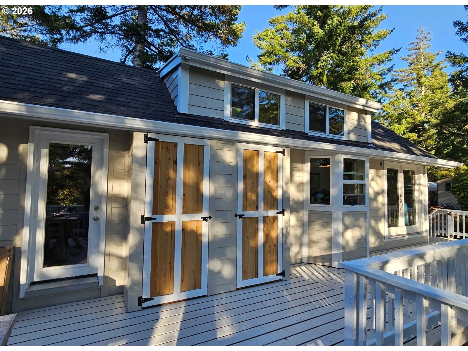 a front view of a house with a porch