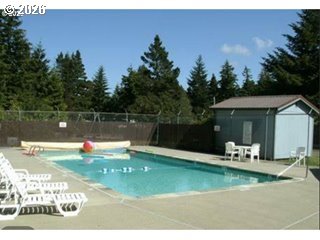 39 Easy Street Florence, OR 97439 - Photo 12 of 24 a view of a house with yard from a lake view