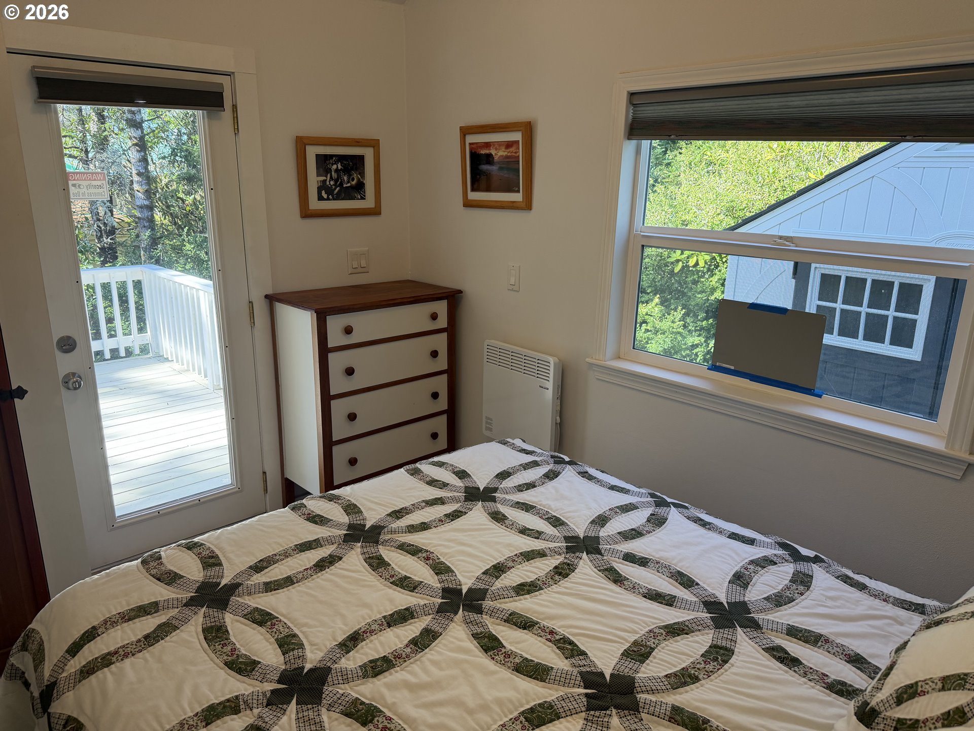 39 Easy Street Florence, OR 97439 - Photo 24 of 24 a bedroom with a bed and a window