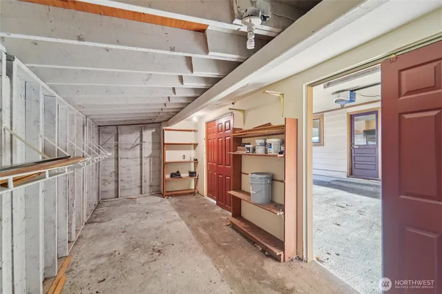 a view of a hallway with closet area