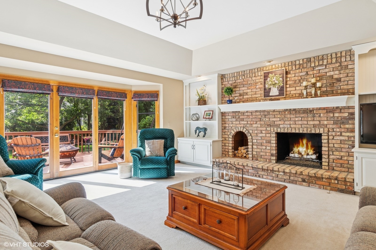727 Mesa Drive Naperville, IL 60565 - Photo 11 of 31 a living room with furniture and a fireplace