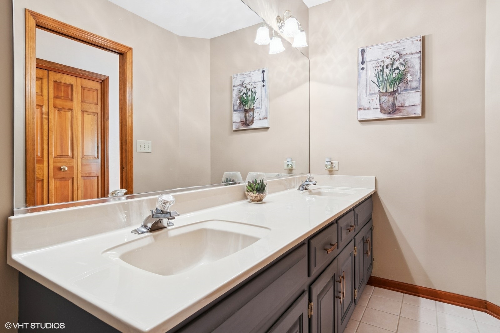 727 Mesa Drive Naperville, IL 60565 - Photo 20 of 31 a bathroom with a sink double vanity and a window