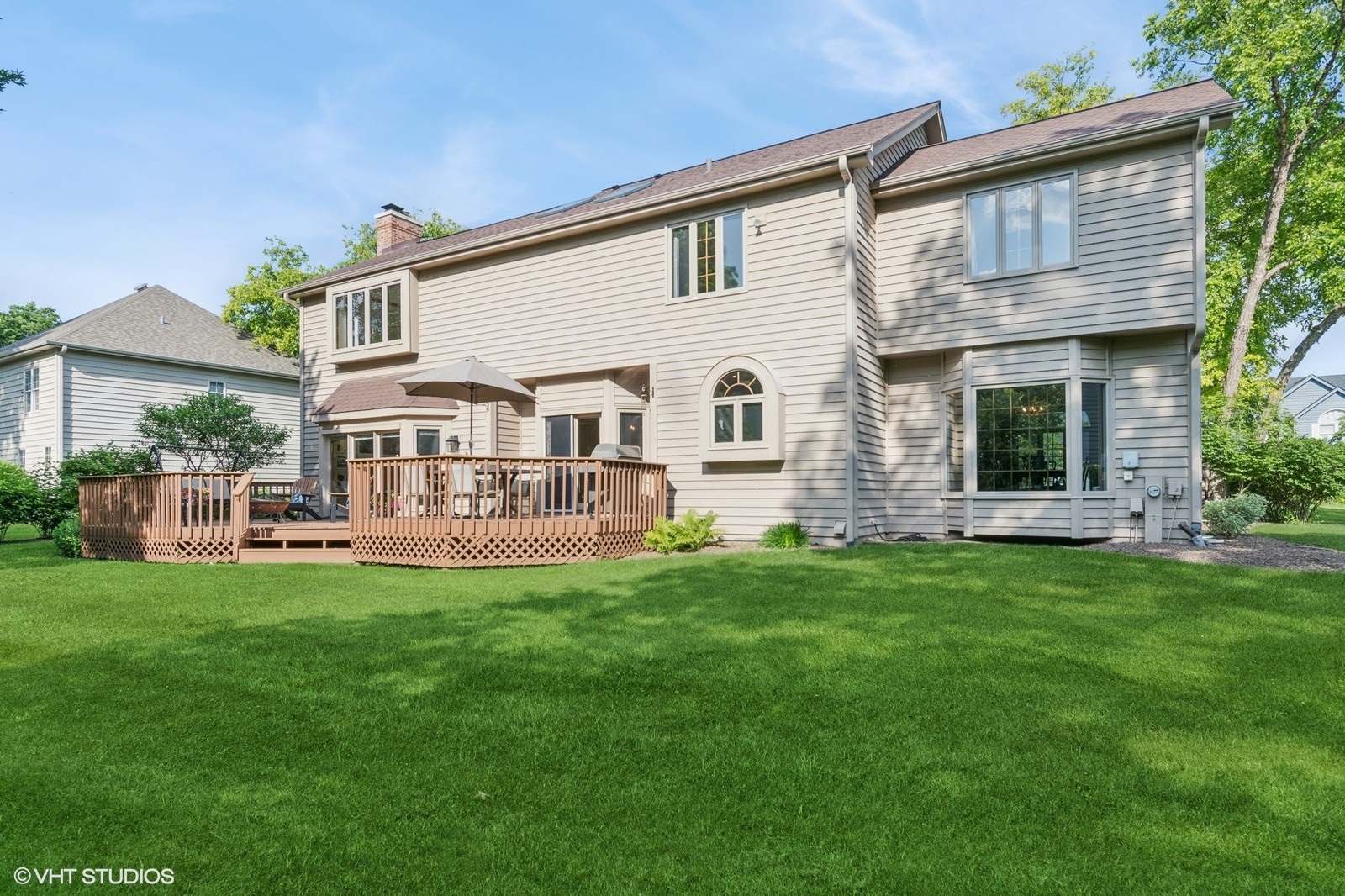 727 Mesa Drive Naperville, IL 60565 - Photo 25 of 31 a view of a house with a backyard