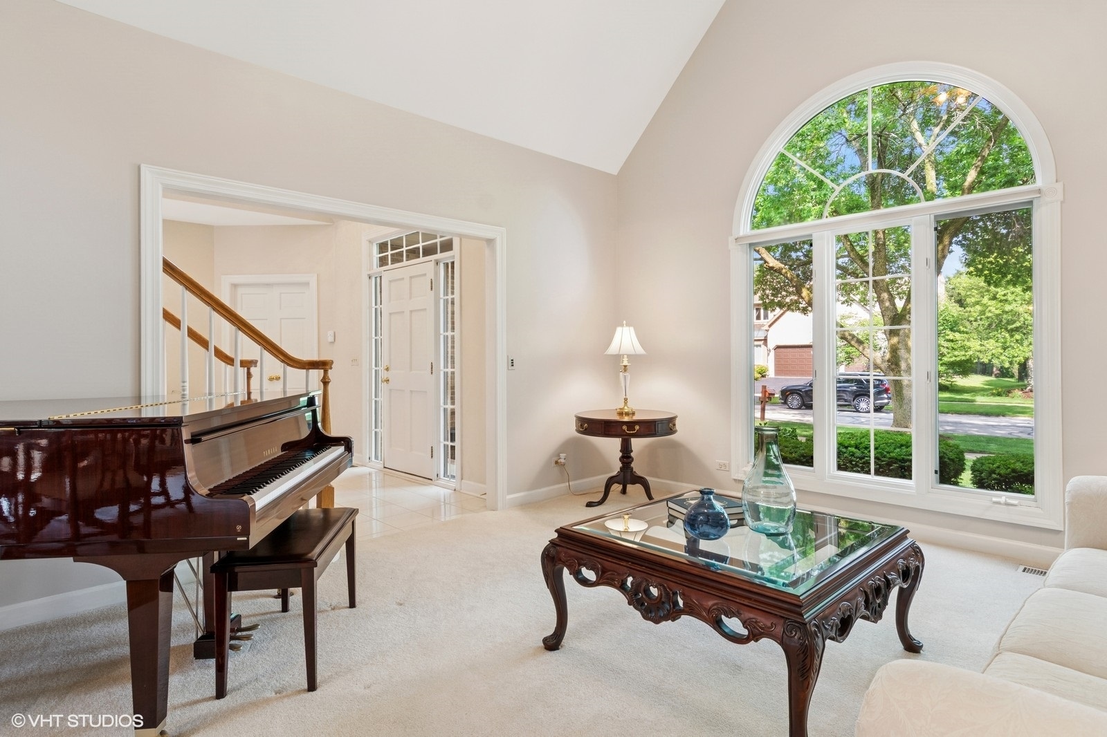 727 Mesa Drive Naperville, IL 60565 - Photo 4 of 31 a living room with furniture a table and a large window