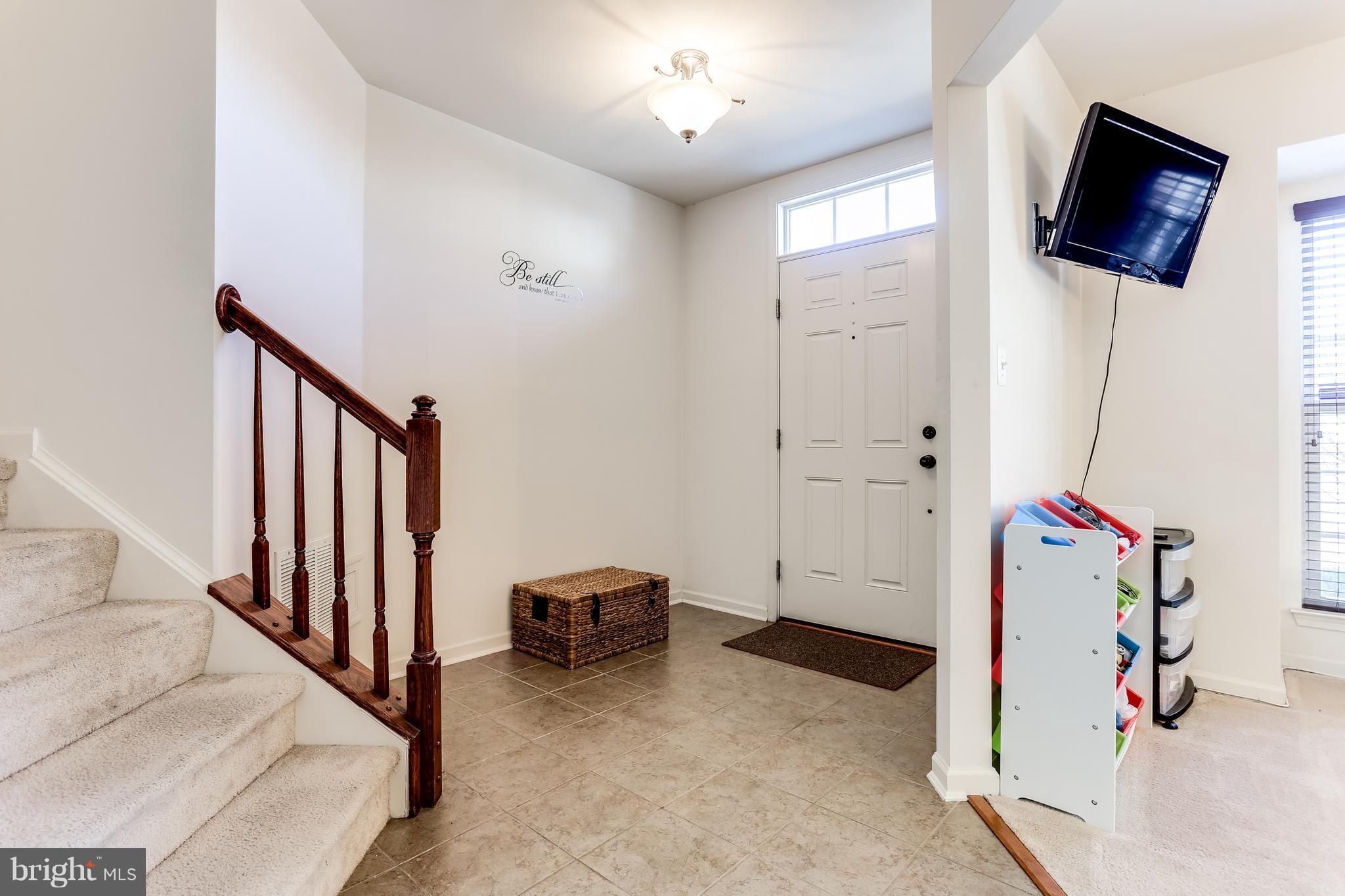 6912 Red Clay Forge, Unit 2 Elkridge, MD 21075 - Photo 2 of 30 a view of an entryway with workspace