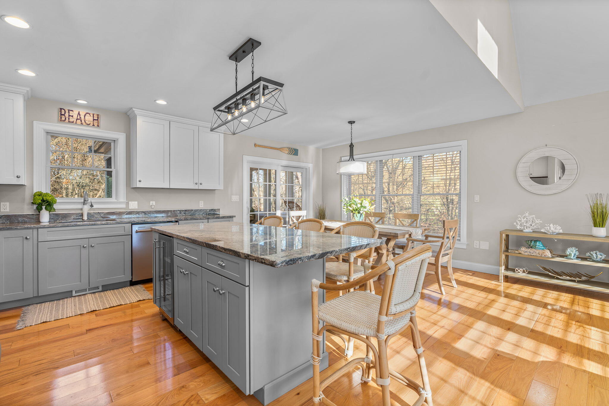 12 South Cedar Street Centerville, MA 02632 - Photo 5 of 42 a kitchen with stainless steel appliances granite countertop a sink and cabinets
