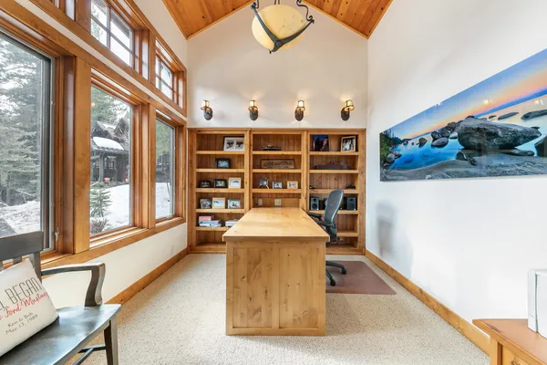 a view of livingroom with furniture and staircase