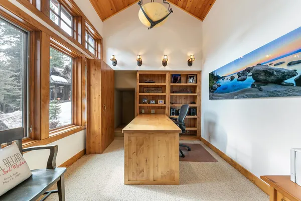 a view of livingroom with furniture and window