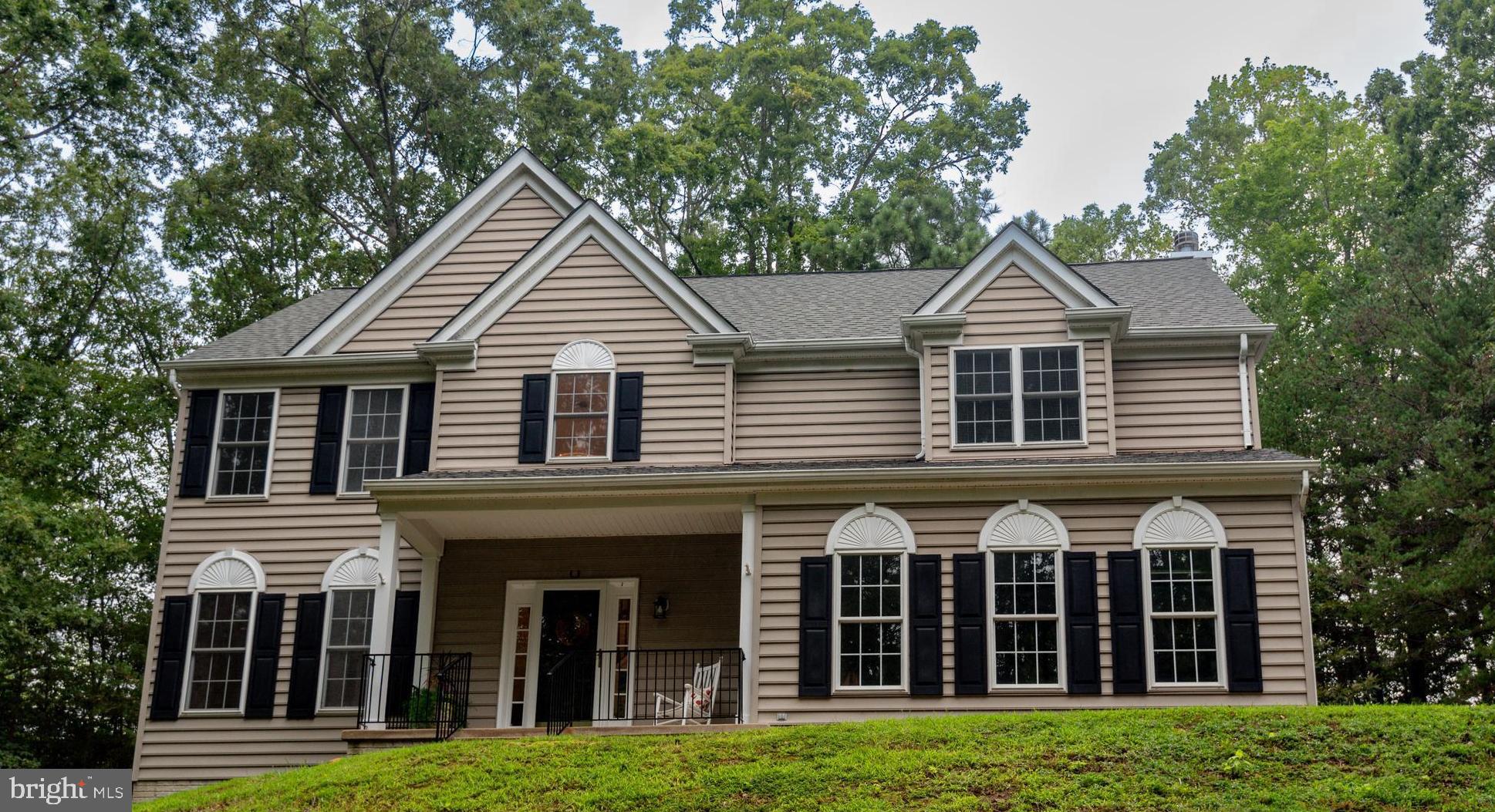 1780 Rudolph Lane Lusby, MD 20657 - Photo 1 of 40 front view of a house with a yard