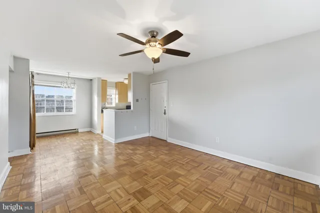 a view of an empty room with a window