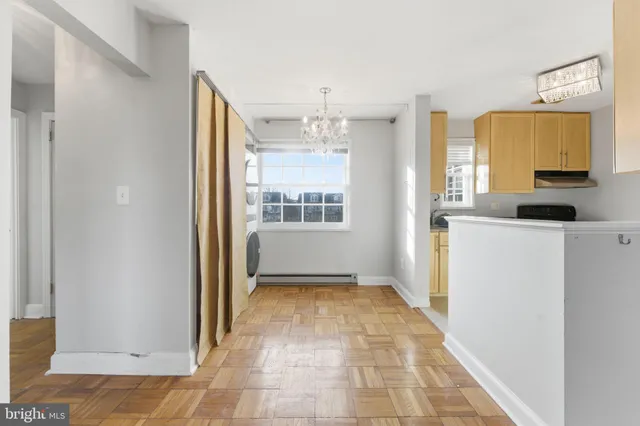 a view of a bathroom from the hallway