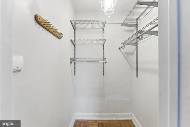 a bathroom with a sink toilet vanity and tub