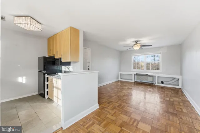 a view of kitchen with furniture and window