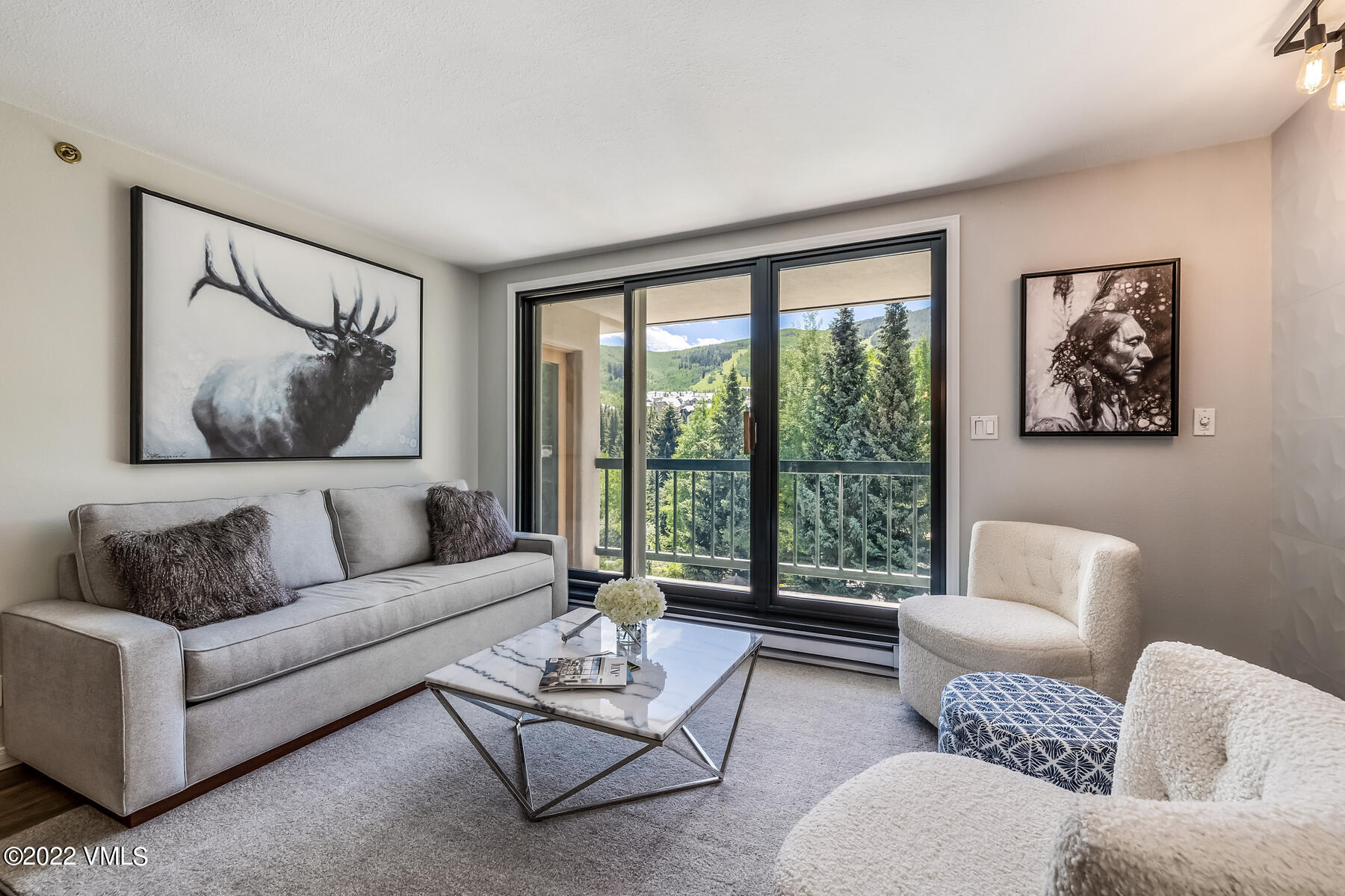 1120 Village Road, Unit 402 Beaver Creek, CO 81620 - Photo 3 of 46 a living room with furniture and a large window