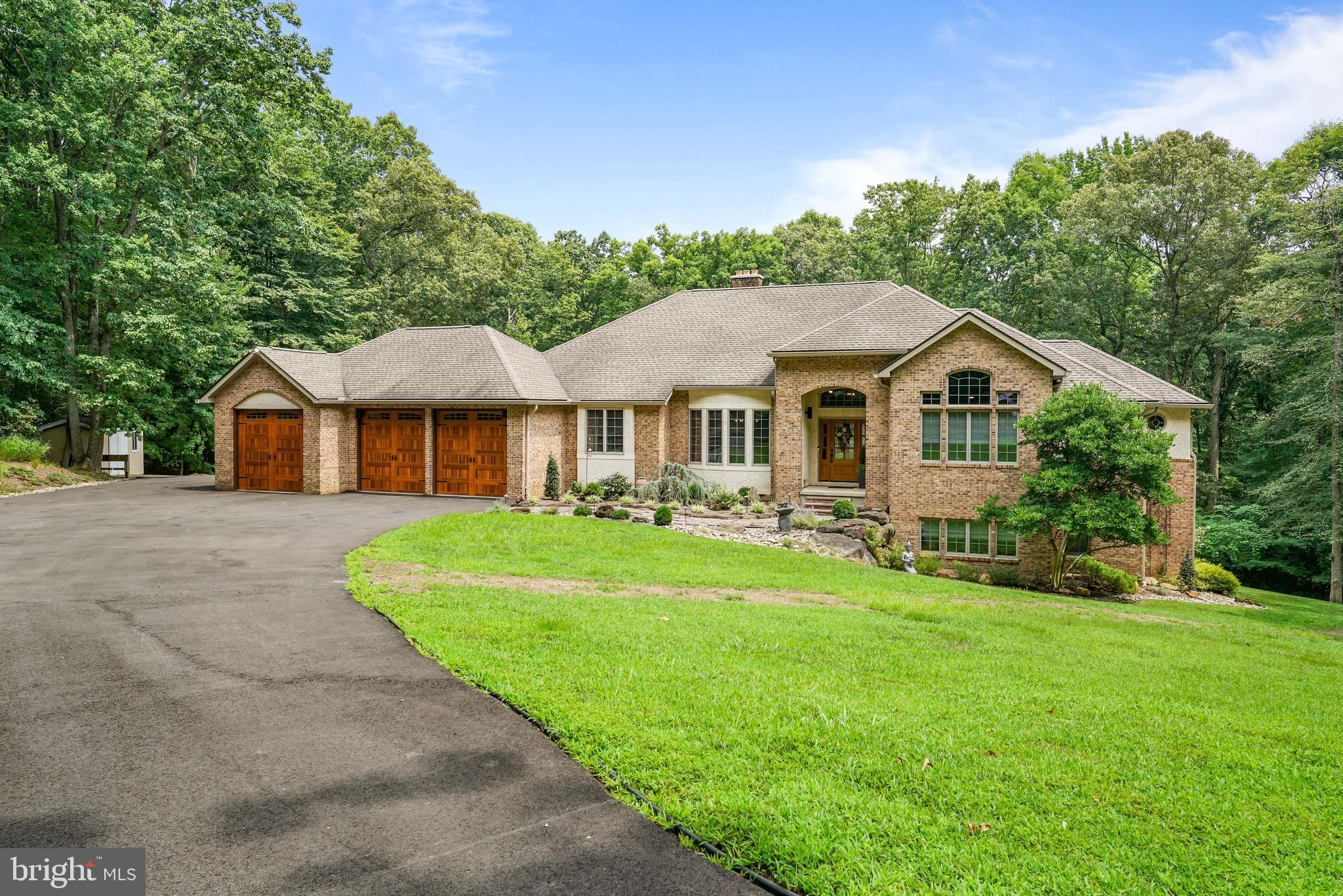 73 Dant Lane Elkton, MD 21921 - Photo 1 of 65 a front view of a house with a yard and trees