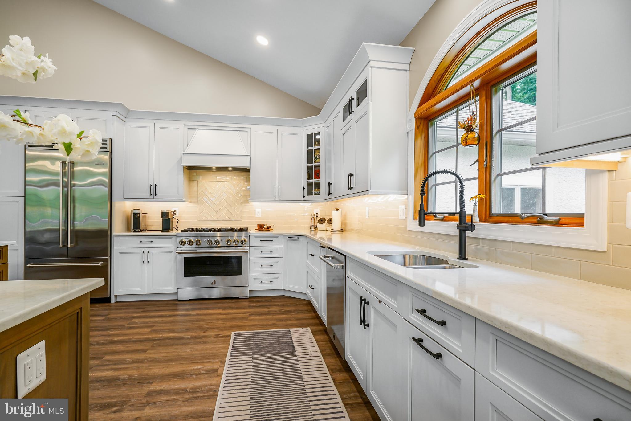73 Dant Lane Elkton, MD 21921 - Photo 15 of 65 a large kitchen with stainless steel appliances granite countertop a stove and a sink