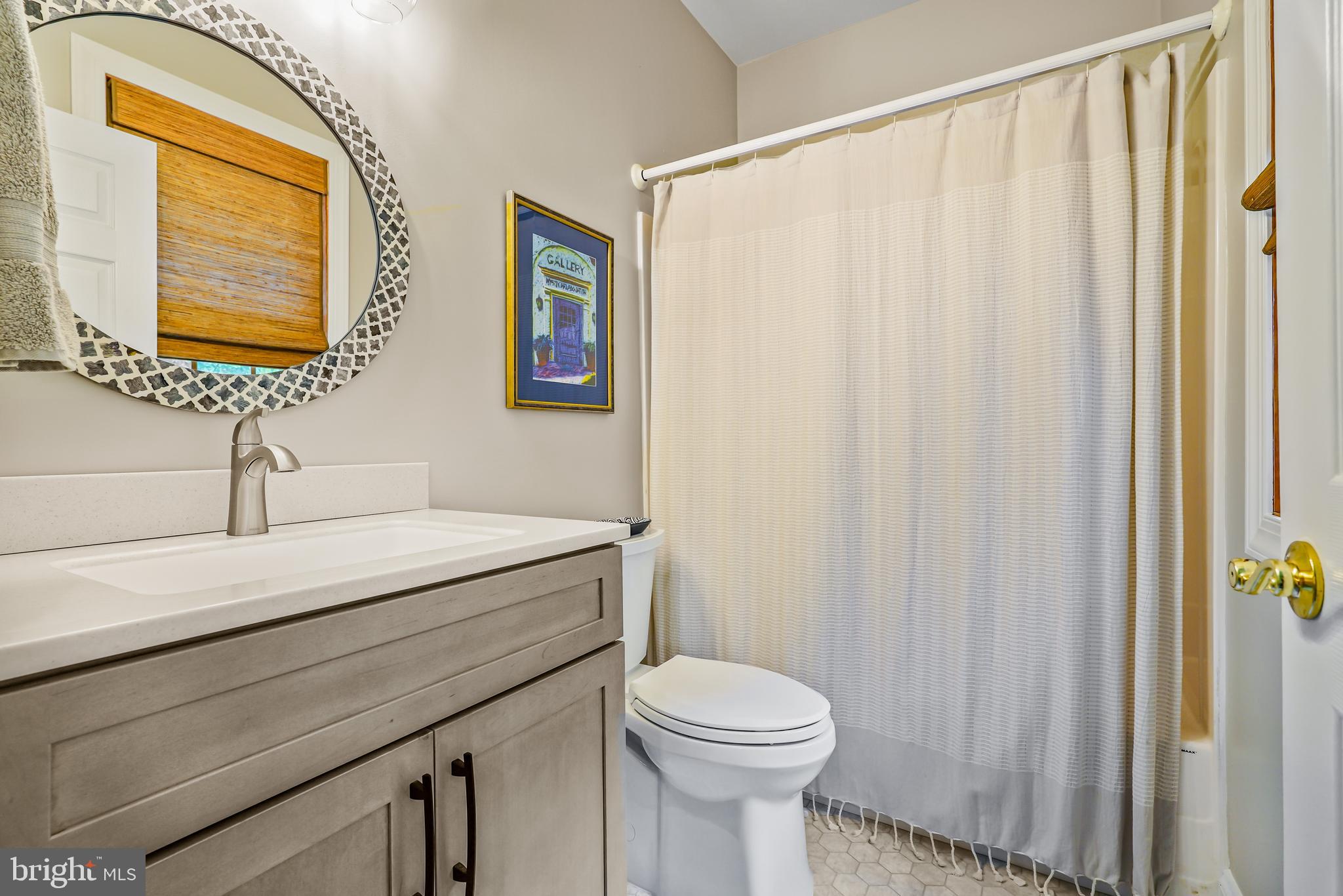 73 Dant Lane Elkton, MD 21921 - Photo 35 of 65 a bathroom with a granite countertop sink and a mirror