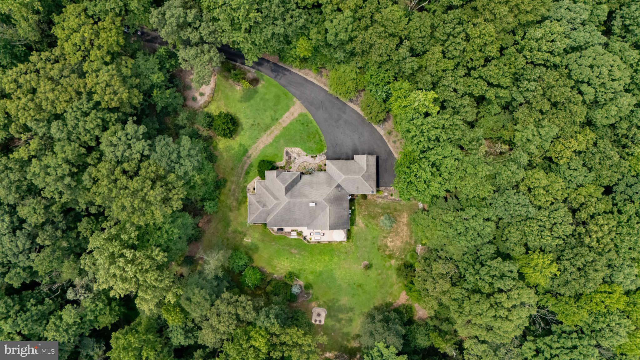 73 Dant Lane Elkton, MD 21921 - Photo 60 of 65 a aerial view of a house with a yard and large trees
