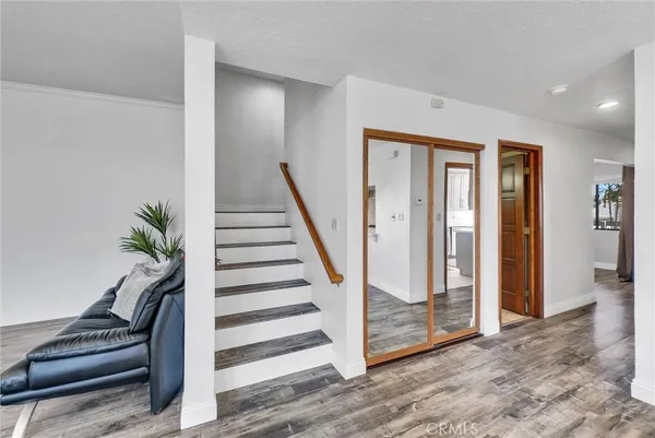 wooden floor with stairs