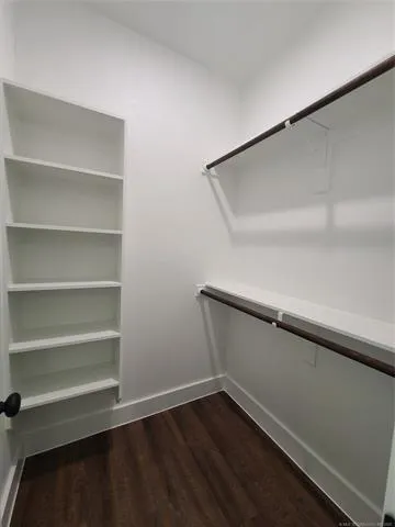 a view of an empty walk in closet