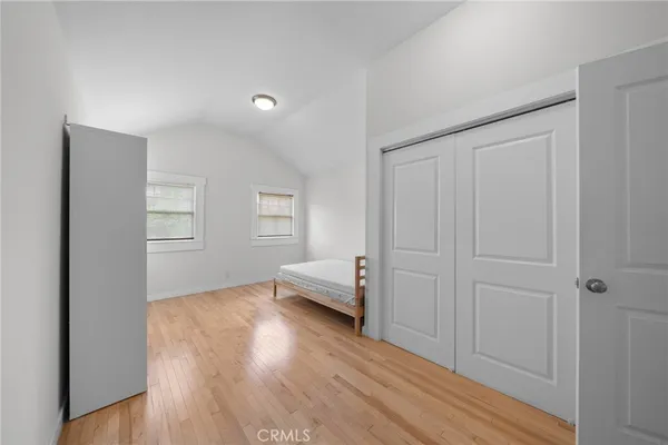 a view of livingroom with hardwood floor and hallway