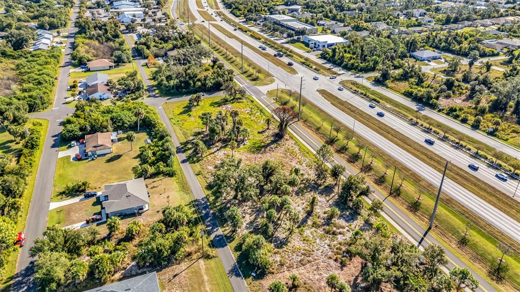 3280 North Access Road Englewood, FL 34224 - Photo 18 of 26 an aerial view of a city