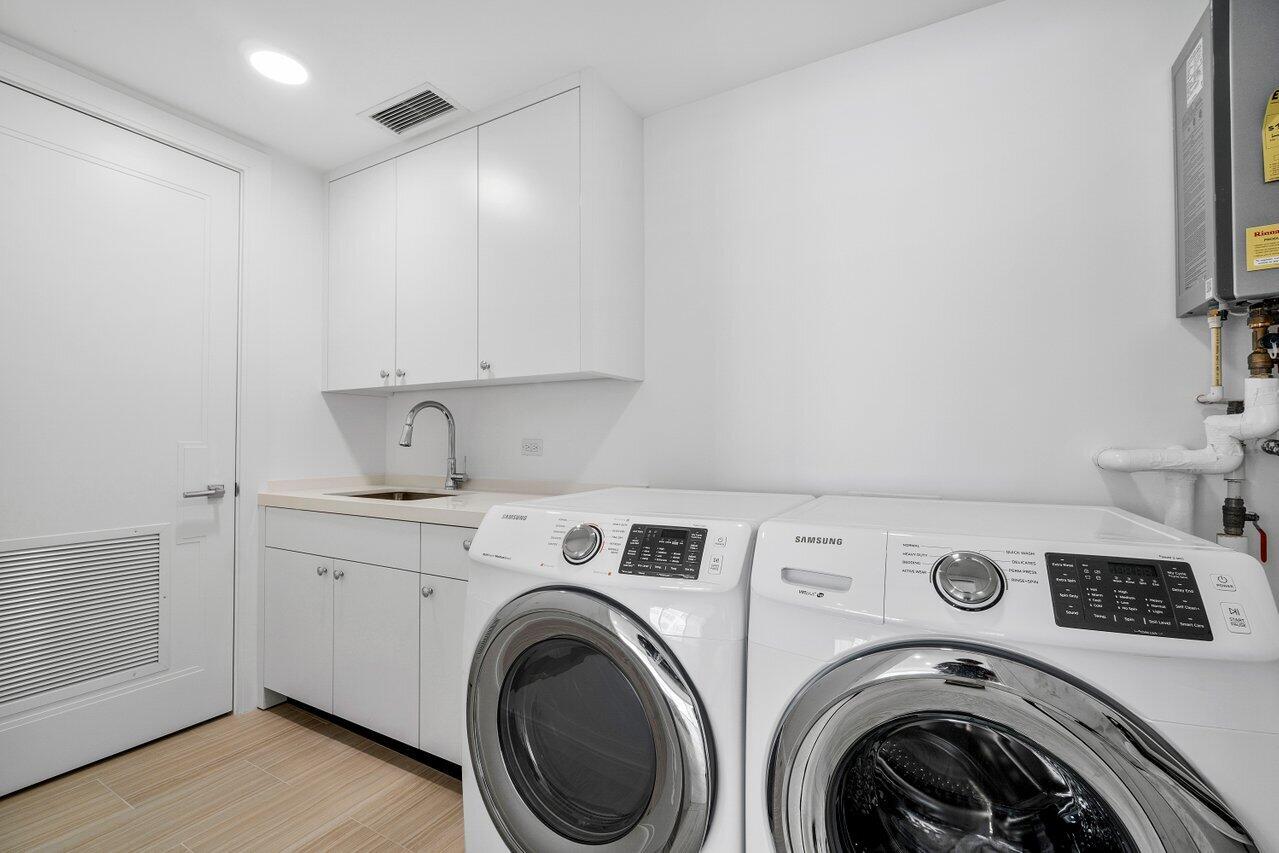 3550 South Ocean Boulevard, Unit 2D South Palm Beach, FL 33480 - Photo 28 of 55 a utility room with dryer and washer