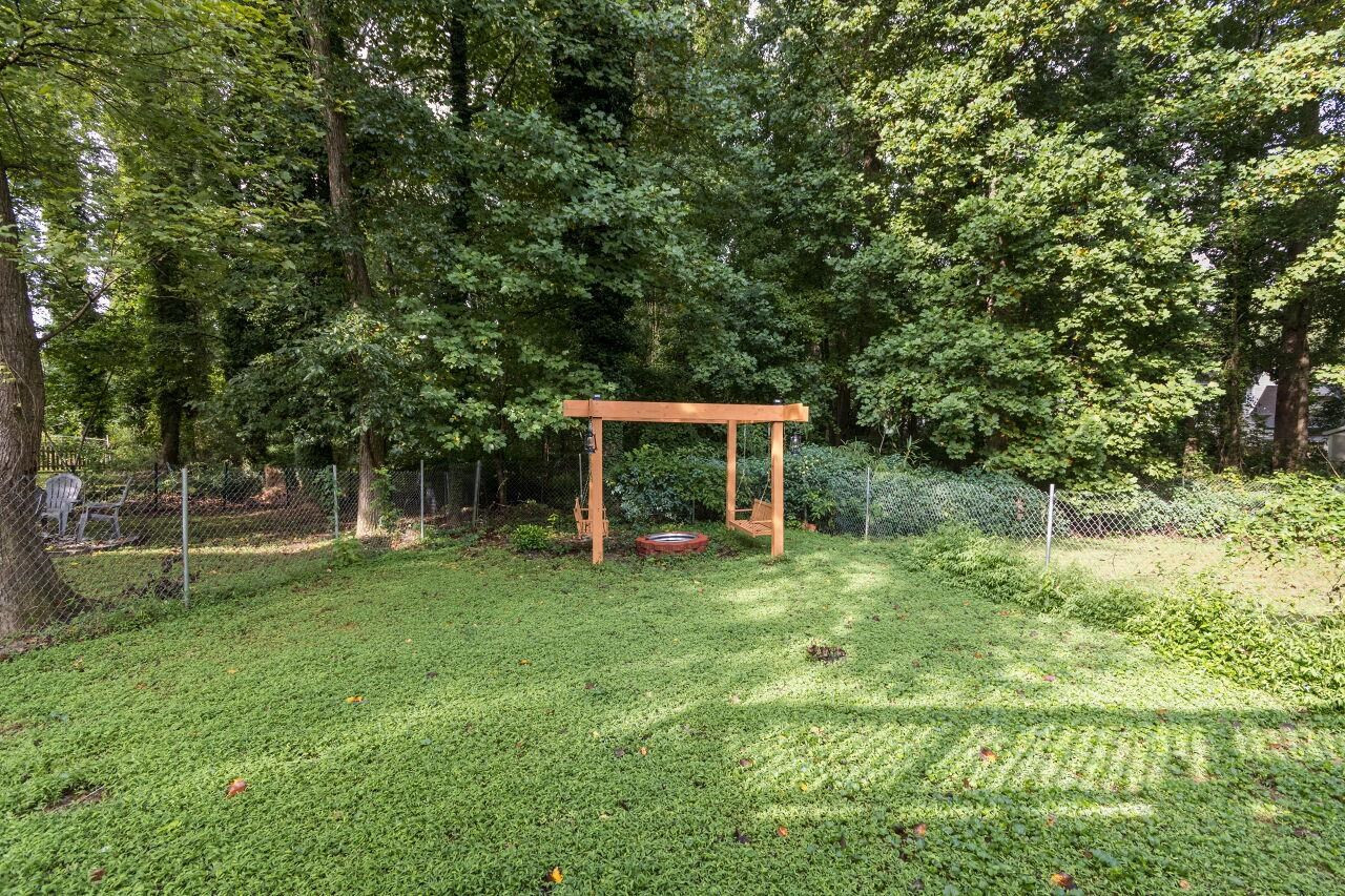 7305 Wilderness Road Raleigh, NC 27613 - Photo 25 of 27 Open Yard