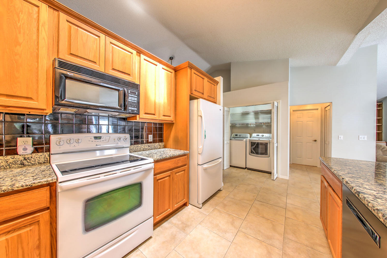2365 Southwest Abner Road Port St. Lucie, FL 34953 - Photo 16 of 52 Galley Kitchen