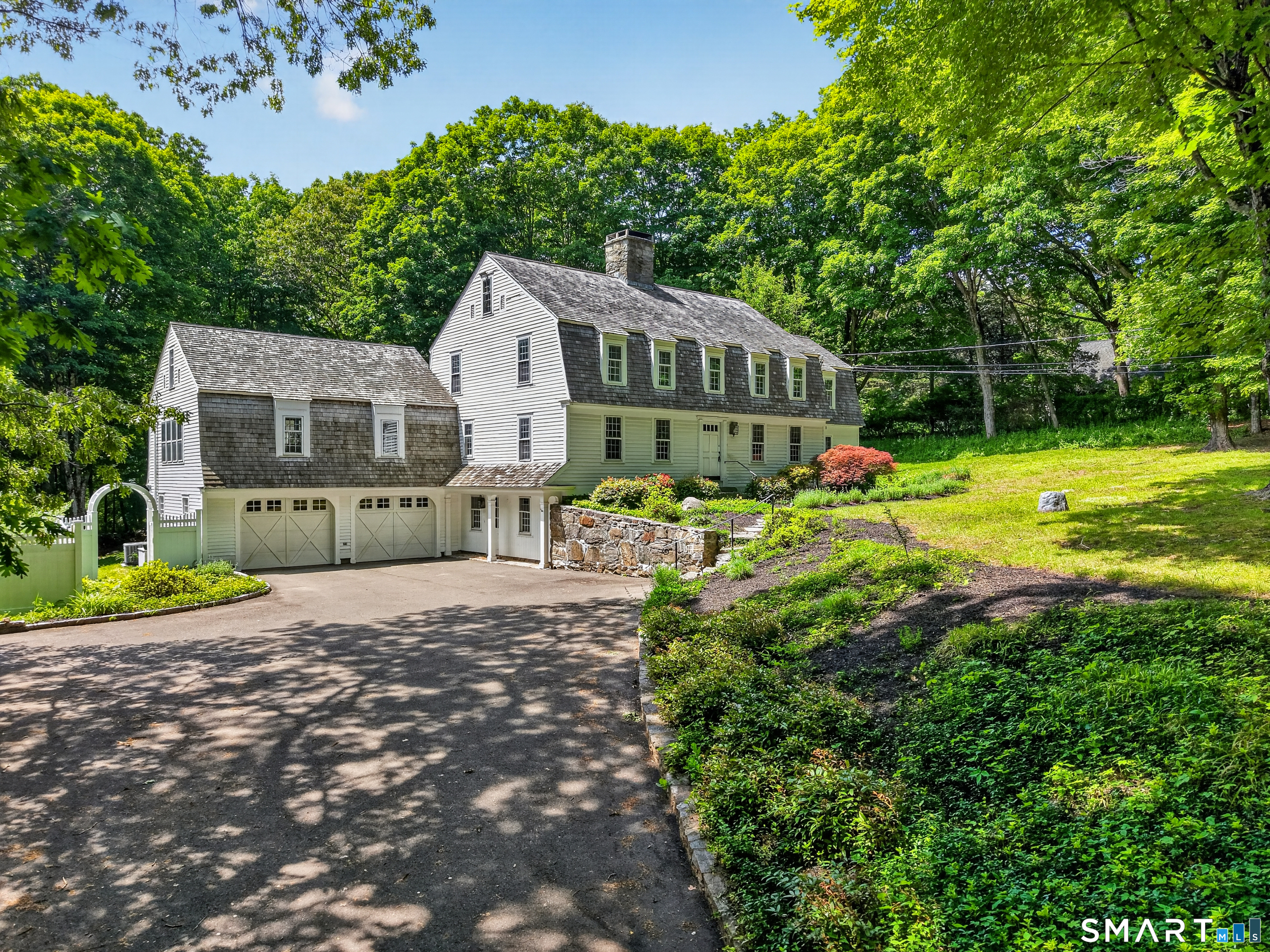 14 Cow Pen Hill Road Killingworth, CT 06419 - Photo 2 of 40 Pride of ownership shines through in the beautifully maintained red cedar exterior, reflecting years of thoughtful stewardship and attention to detail