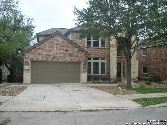 16202 Juan Tabo Way Helotes, TX 78023 - Photo 2 of 22 front view of a house