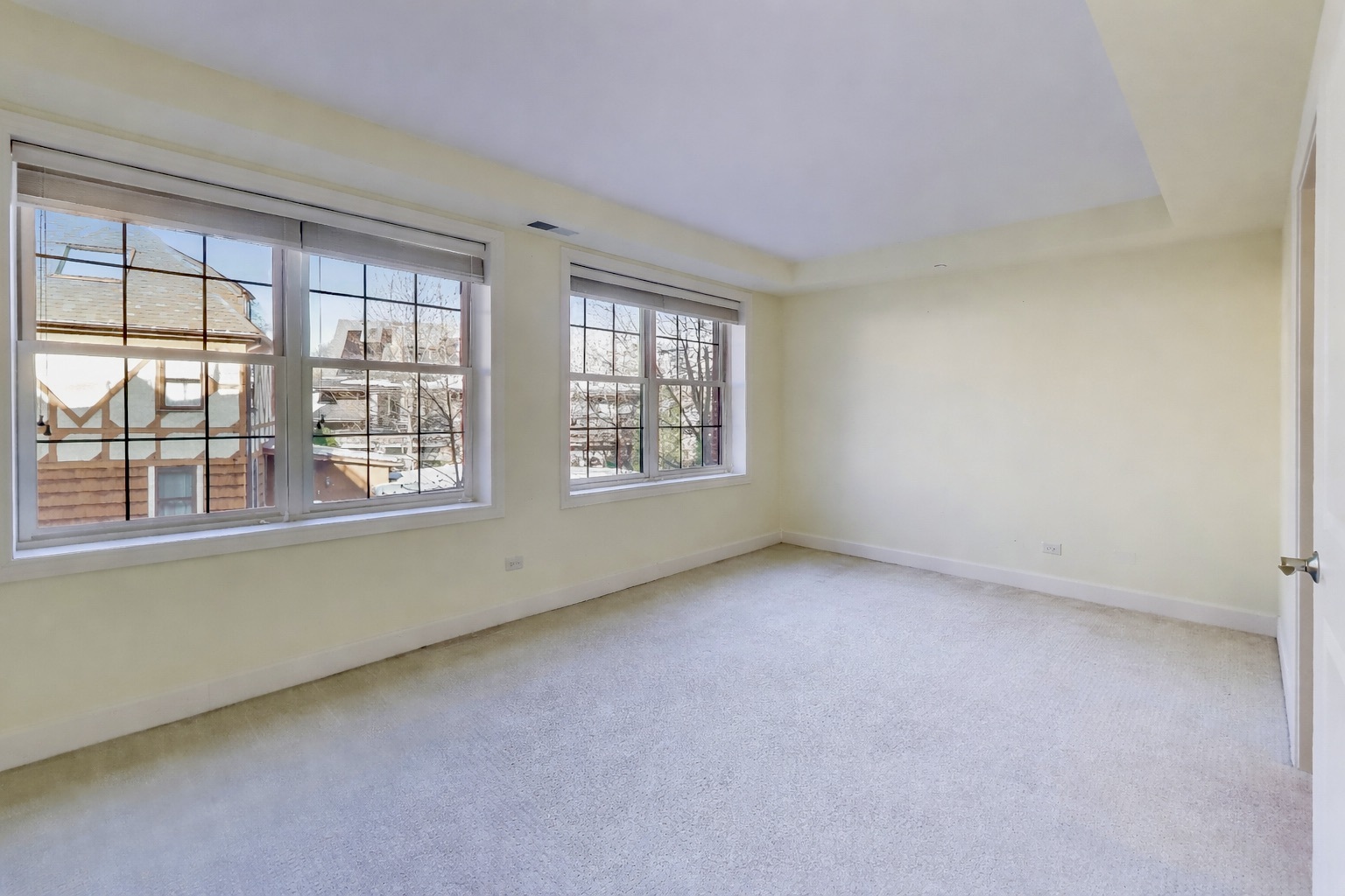 10 East Burlington Street, Unit 2C Riverside, IL 60546 - Photo 15 of 46 an empty room with a window