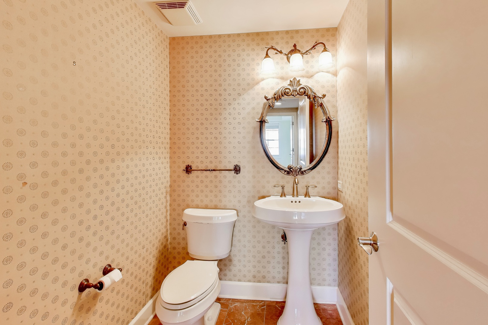 10 East Burlington Street, Unit 2C Riverside, IL 60546 - Photo 16 of 53 a bathroom with a toilet sink and mirror
