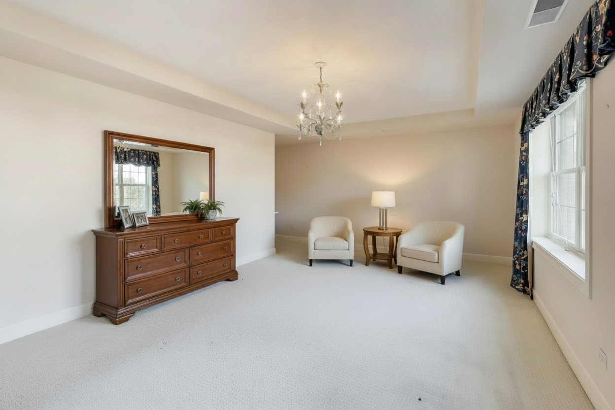 10 East Burlington Street, Unit 2C Riverside, IL 60546 - Photo 17 of 51 a living room with furniture and a chandelier
