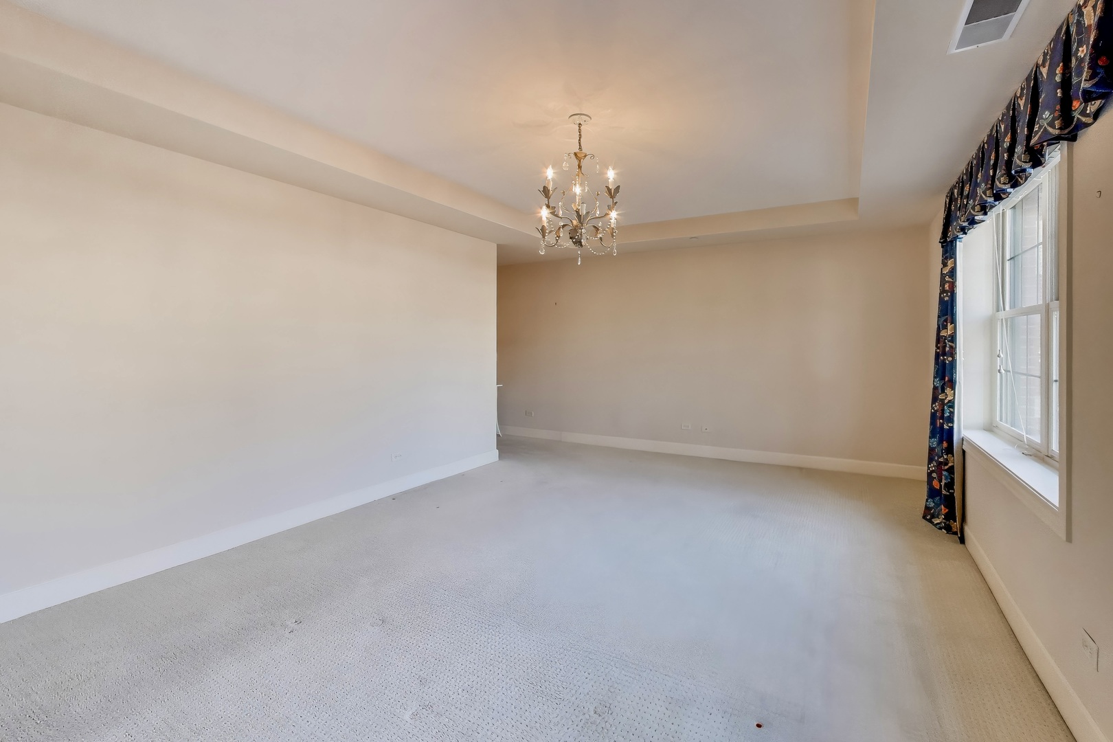 10 East Burlington Street, Unit 2C Riverside, IL 60546 - Photo 20 of 53 wooden floor in an empty room with a window