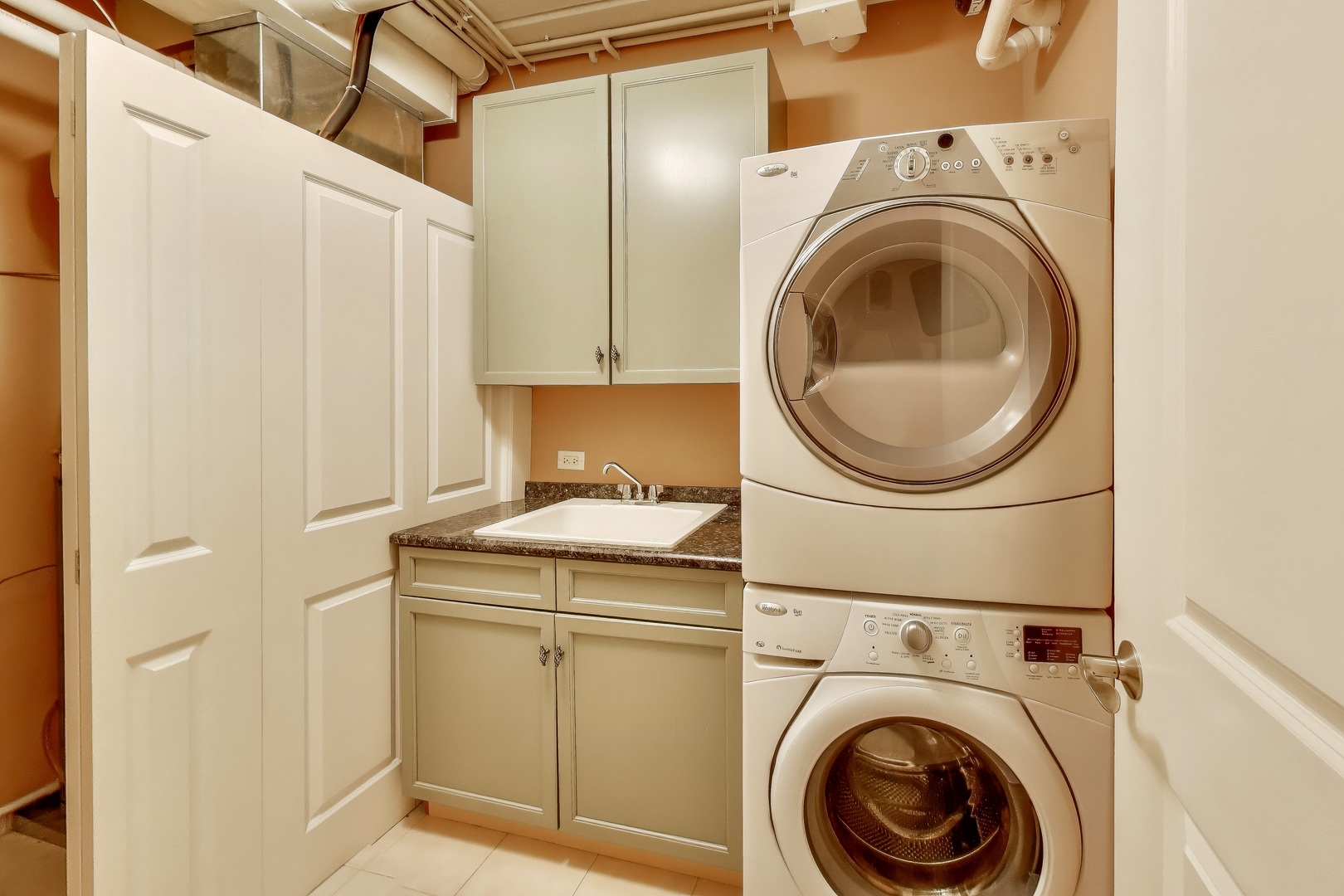 10 East Burlington Street, Unit 2C Riverside, IL 60546 - Photo 30 of 51 a utility room with dryer and washer