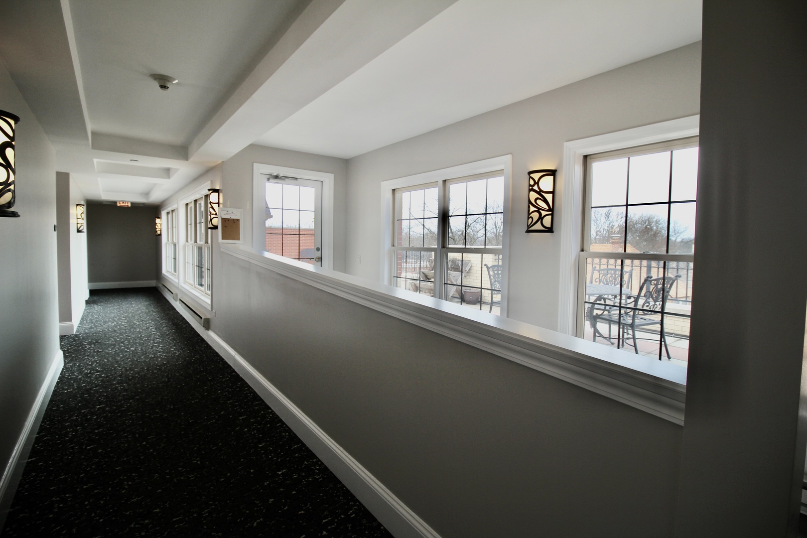 10 East Burlington Street, Unit 2C Riverside, IL 60546 - Photo 34 of 51 wooden floor in an empty room with a window