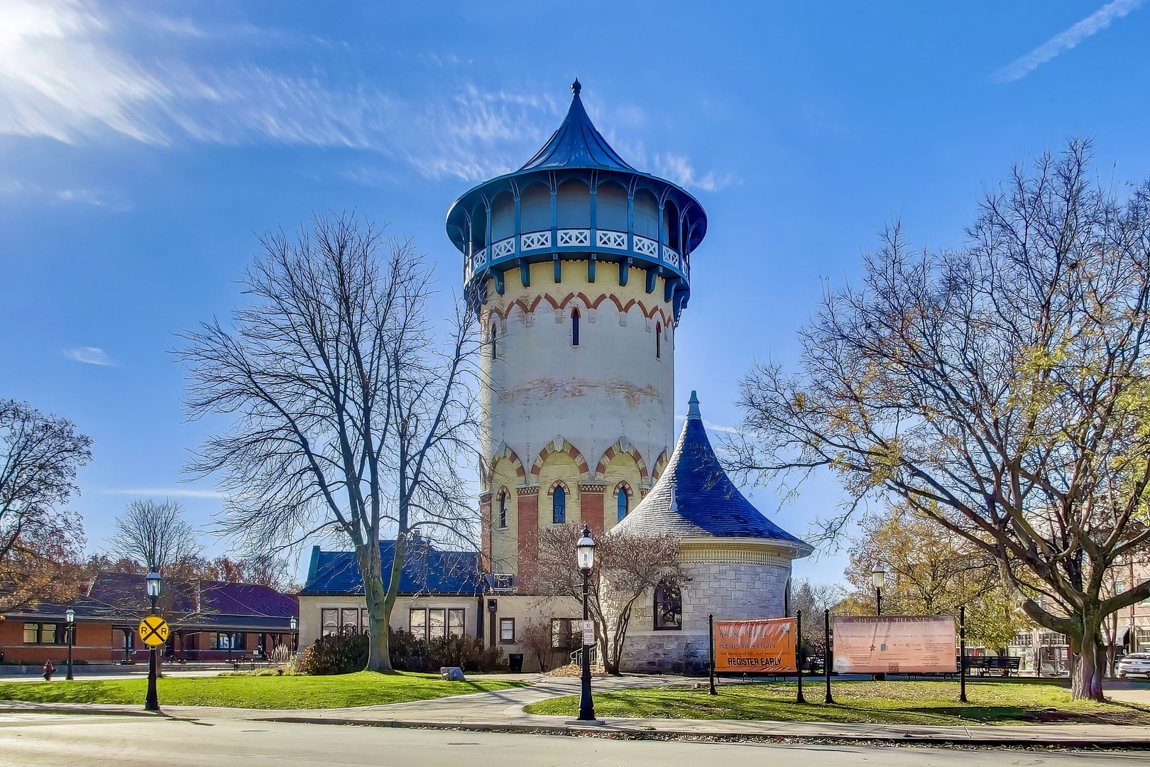 10 East Burlington Street, Unit 2C Riverside, IL 60546 - Photo 38 of 46 a sign board with buildings in the background