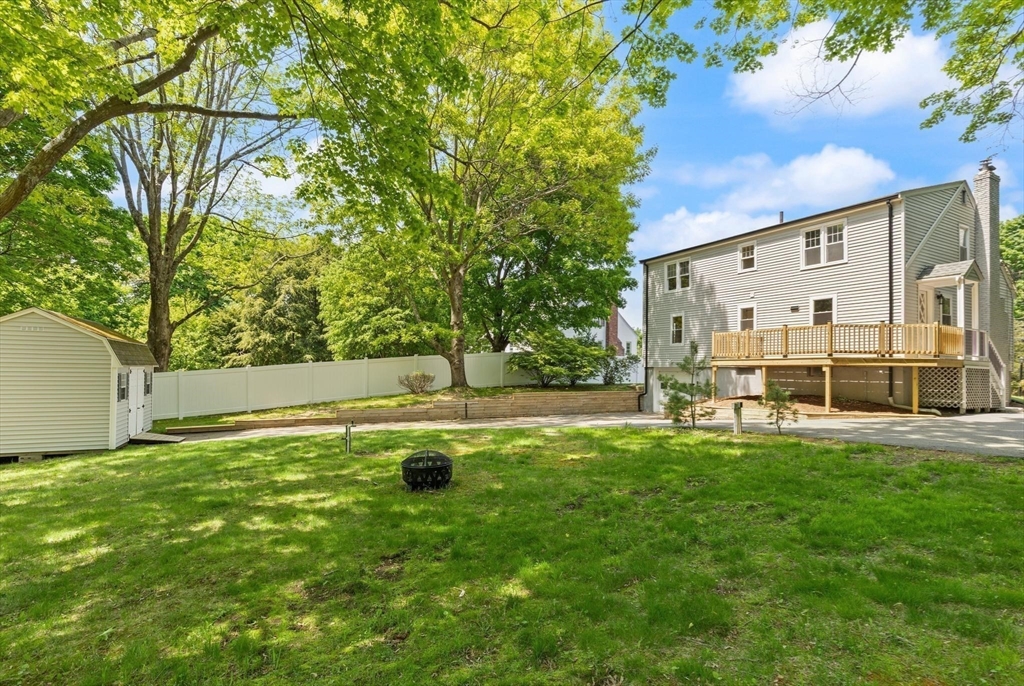 1049 Pleasant Street Canton, MA 02021 - Photo 15 of 16 a view of backyard with swimming pool