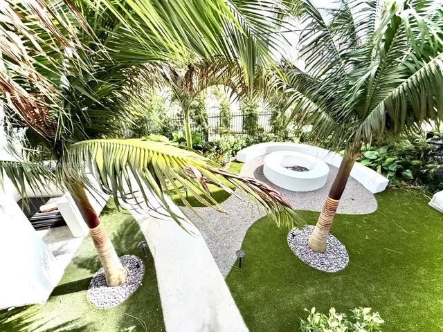 a view of swimming pool with seating space